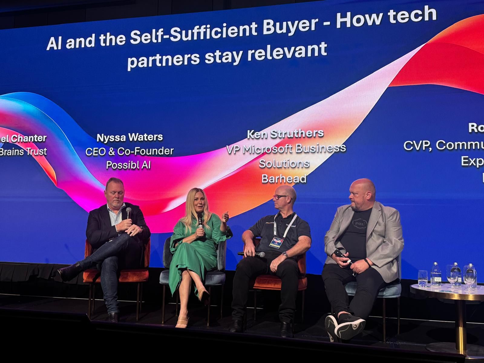 Nyssa Waters speaking on an AI panel at a technology conference